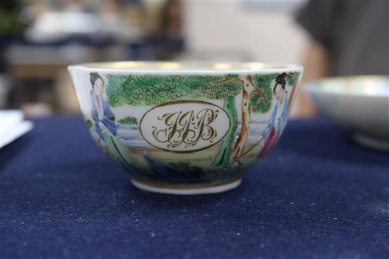 A Cantonese porcelain tea bowl and saucer, with gilt painted European monograms